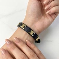 دستبند زنانه چرم مدل سلین از جنس پلاک استیل