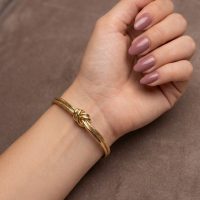 دستبند زنانه مدل بنگل طرح گره از جنس ابکاری رادیوم